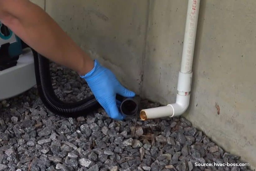 Vacuum the Drain Pipe-Aircon maintenance Singapore