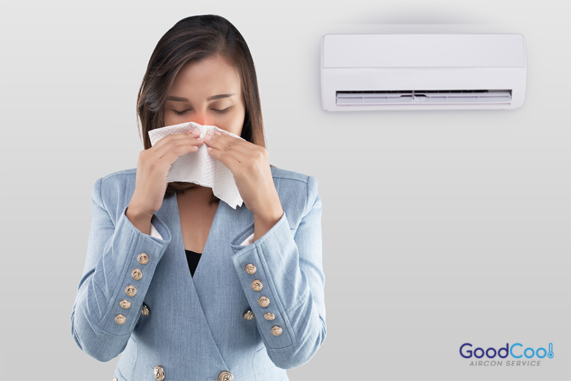 a woman having allergies-Aircon maintenance Singapore