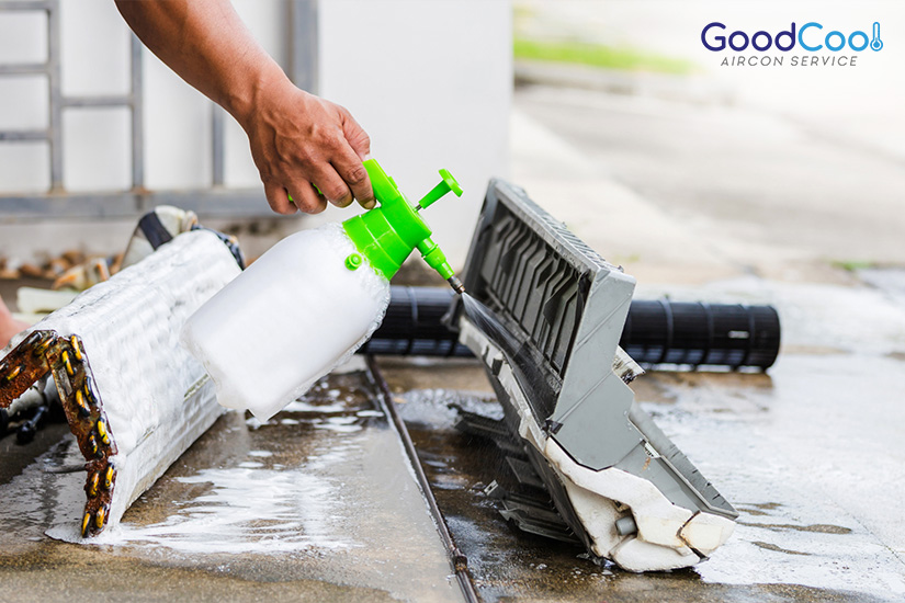 Cleaning the condenser coil of an aircon unit